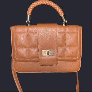 Elegant Tan Tan quilted crossbody bag with a gold-tone accents braided handle